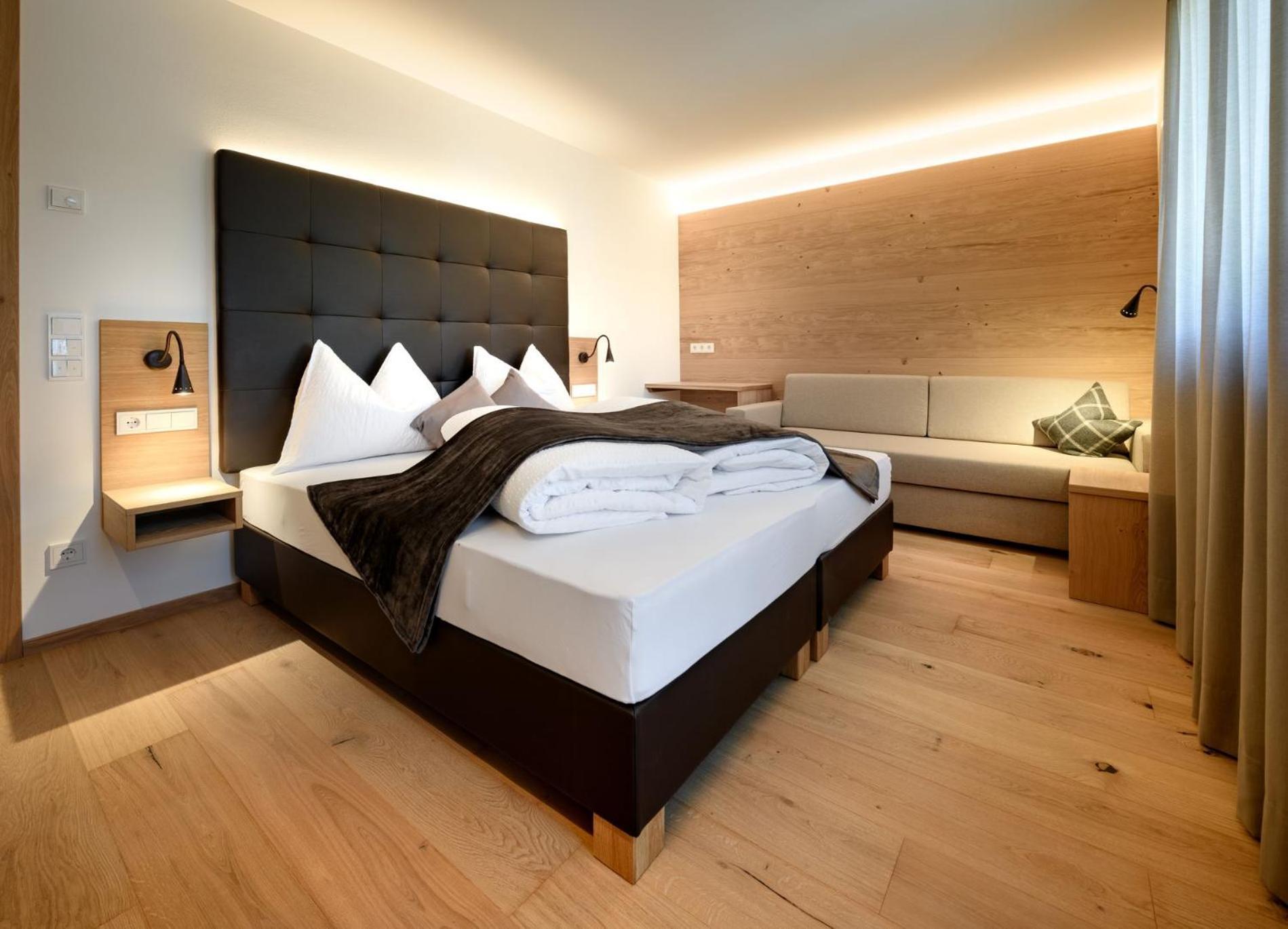 Apartments Burvel Selva di Val Gardena Pokoj fotografie